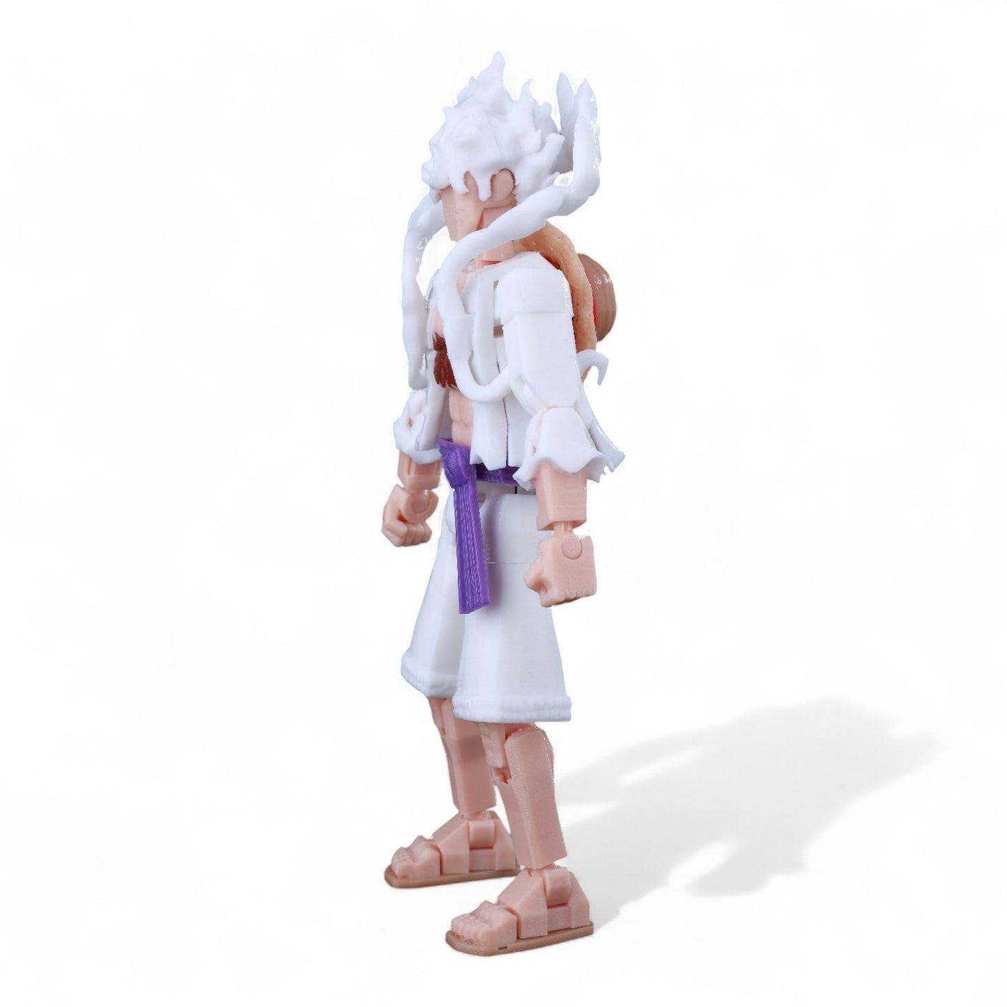 Side view of Gear 5 Nika Luffy anime figure – poseable joints visible