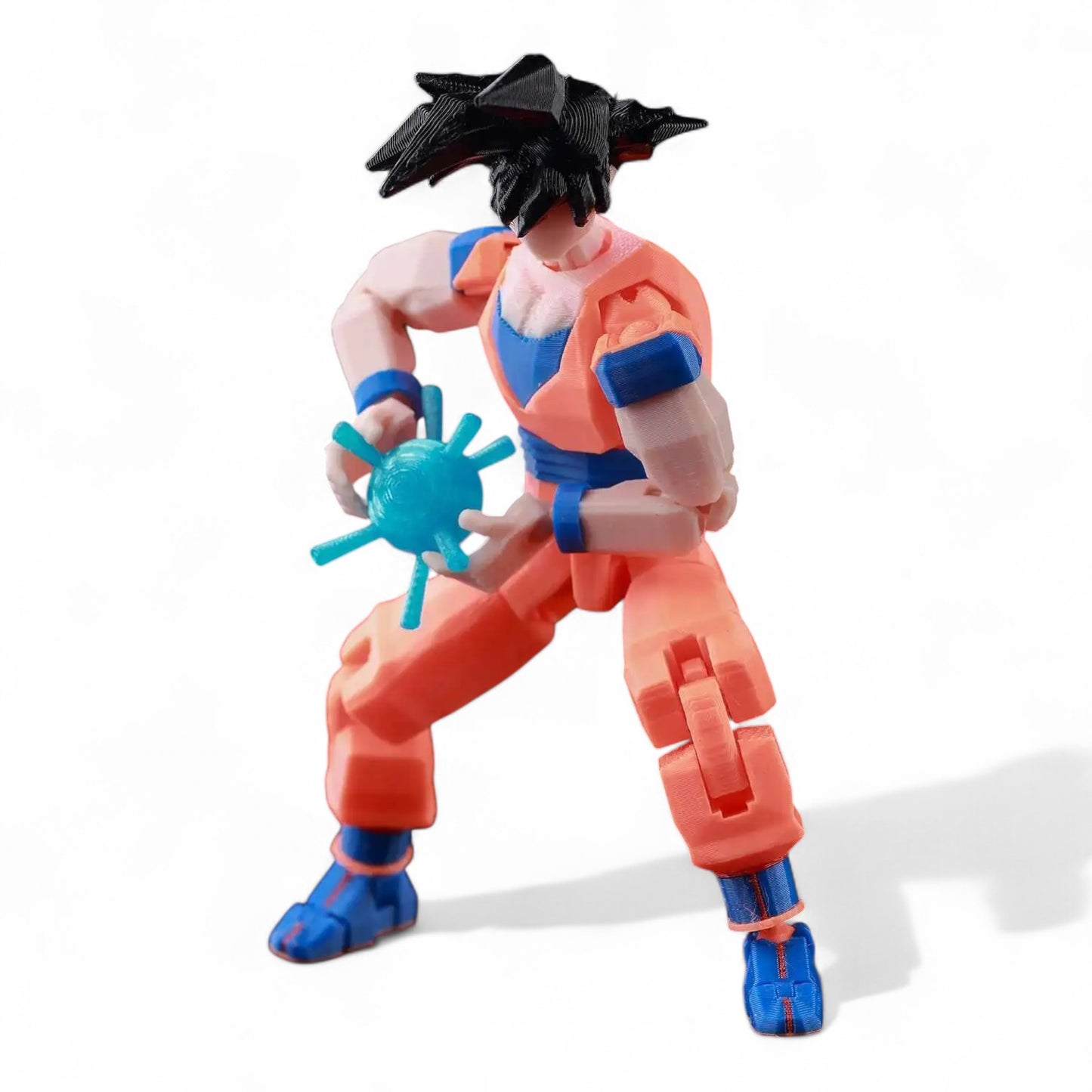 Front view of Goku Titan13-style poseable figure in classic pose