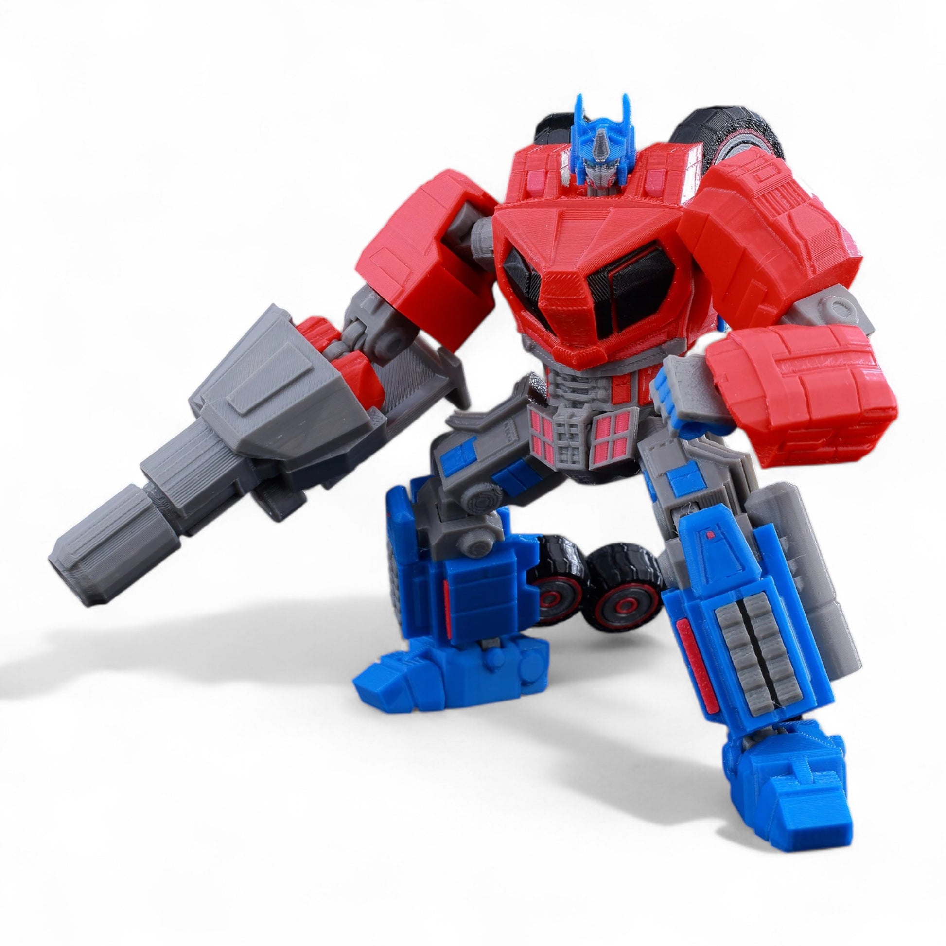Optimus Prime figure in dramatic action pose