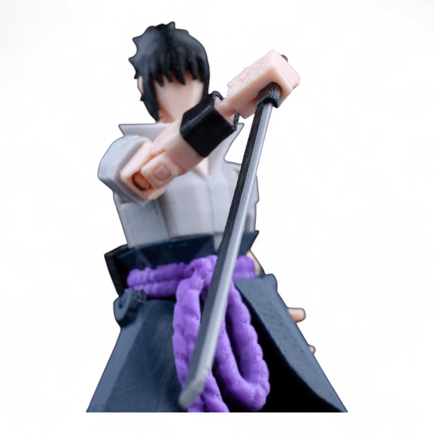 Dynamic ninja action pose – Sasuke Titan13-style toy